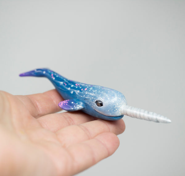 Galaxy Surfing Narwhal Figurine