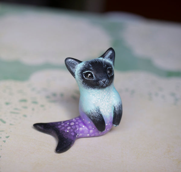 Blue and purple siamese merkitty figurine