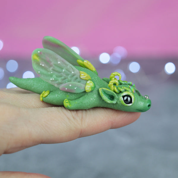 Green and Yellow Bored Dragon Figurine