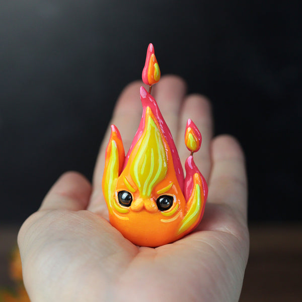 Arms Cat Flame Figurine