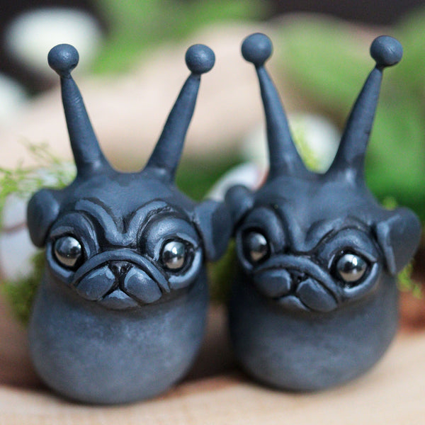 Black Snug Figurine
