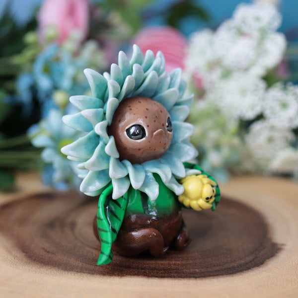 Grumpy Blue Flower Figurine