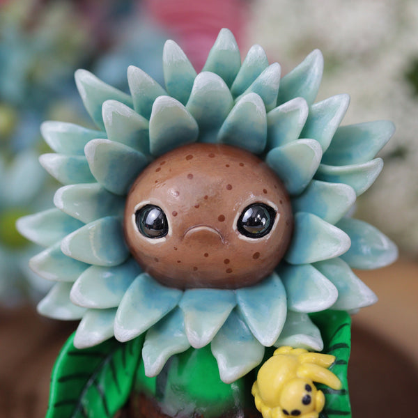Grumpy Blue Flower Figurine