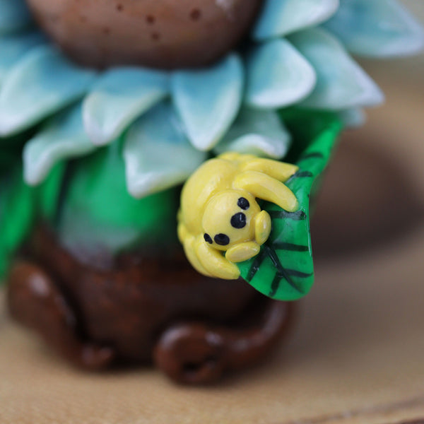 Grumpy Blue Flower Figurine