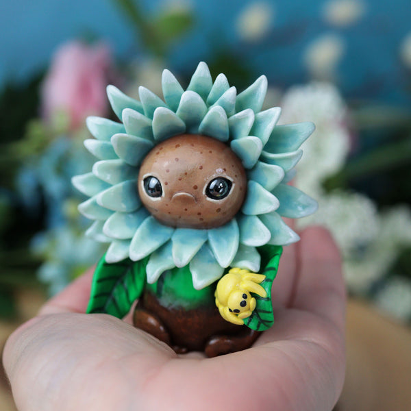 Grumpy Blue Flower Figurine