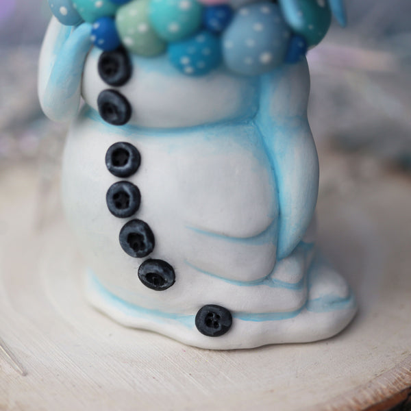 Blue Snowman Figurine