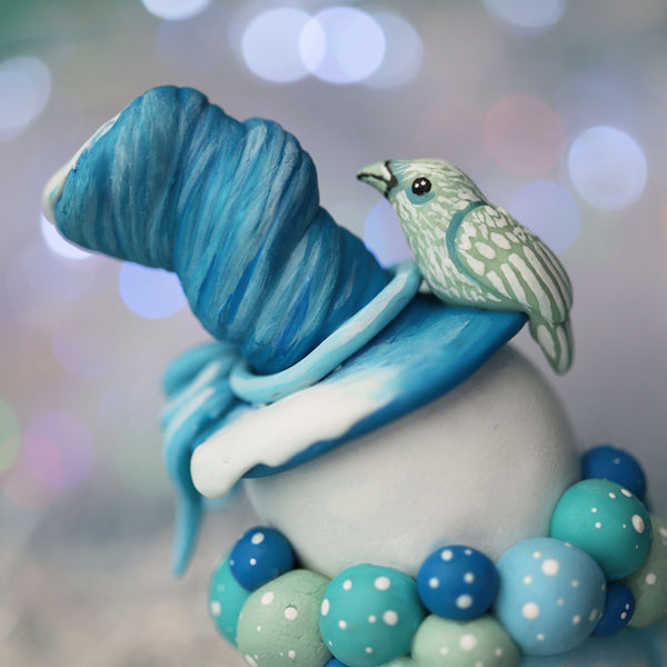 Blue Snowman Figurine