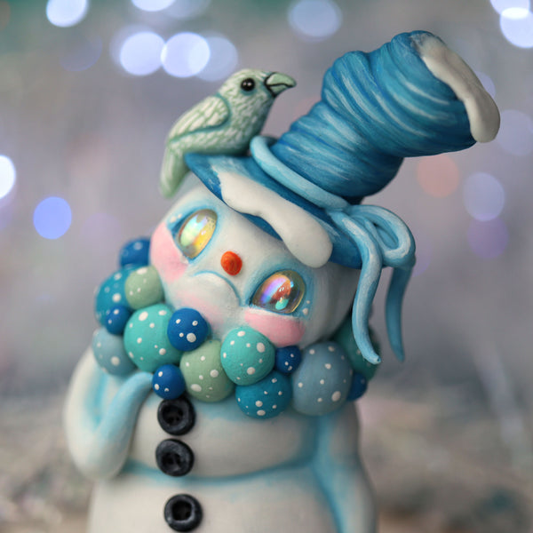 Blue Snowman Figurine