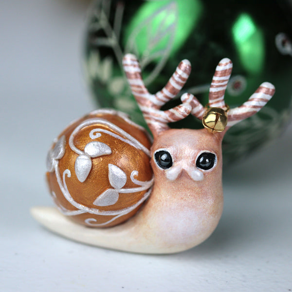 Gold Hollypod Figurine