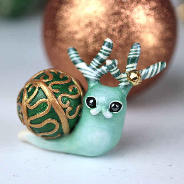 Green Hollypod Figurine