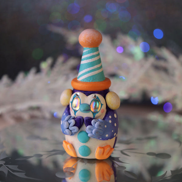 Purple Penguin Clown Figurine