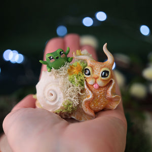 Yellow Snail and Frob Figurine