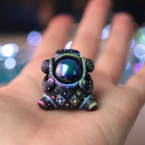 RESERVED astronaut figurine