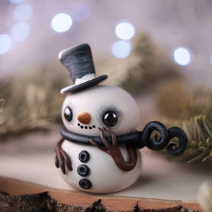 Reserved Black Snow Chap Figurine