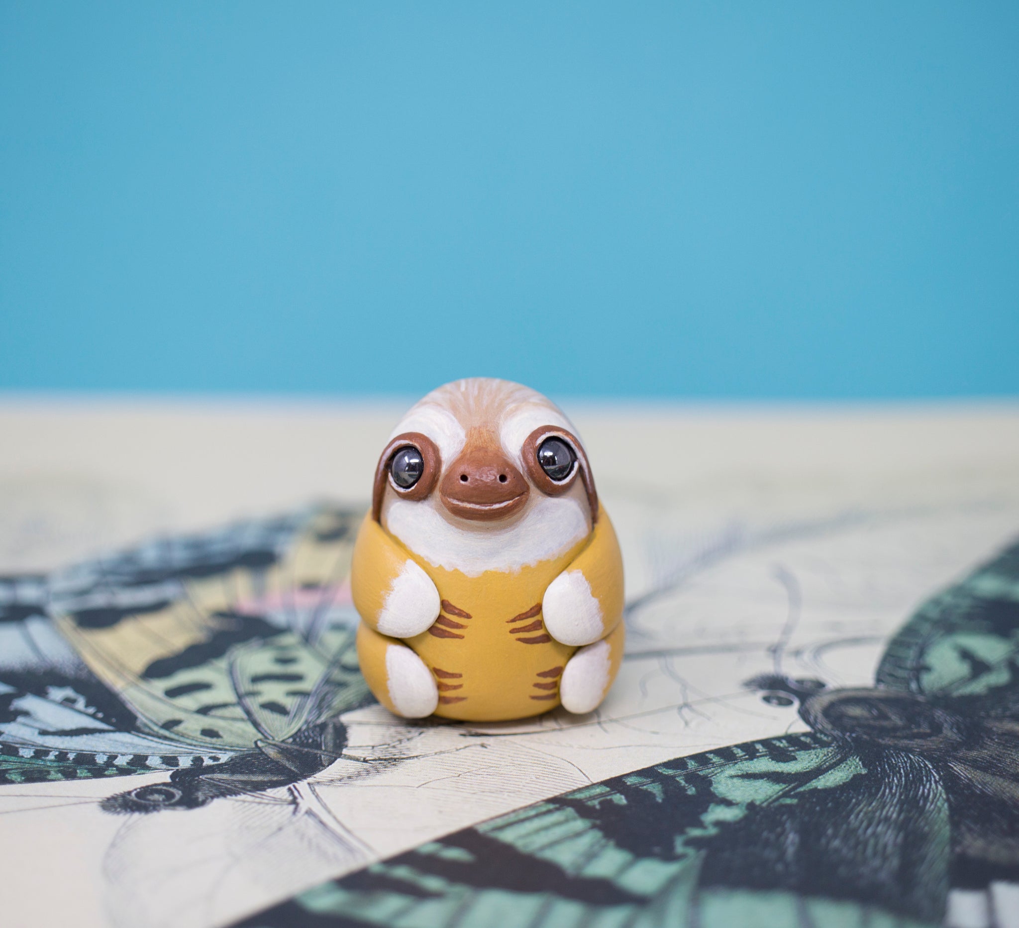 Mustard Sloth Figurine