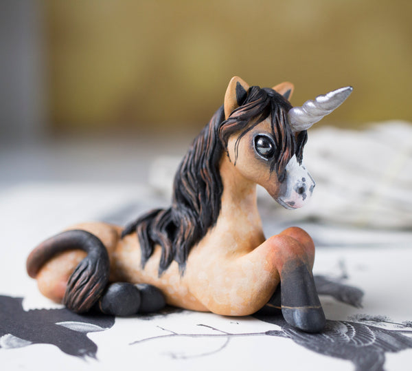 Tan Unicorn Figurine