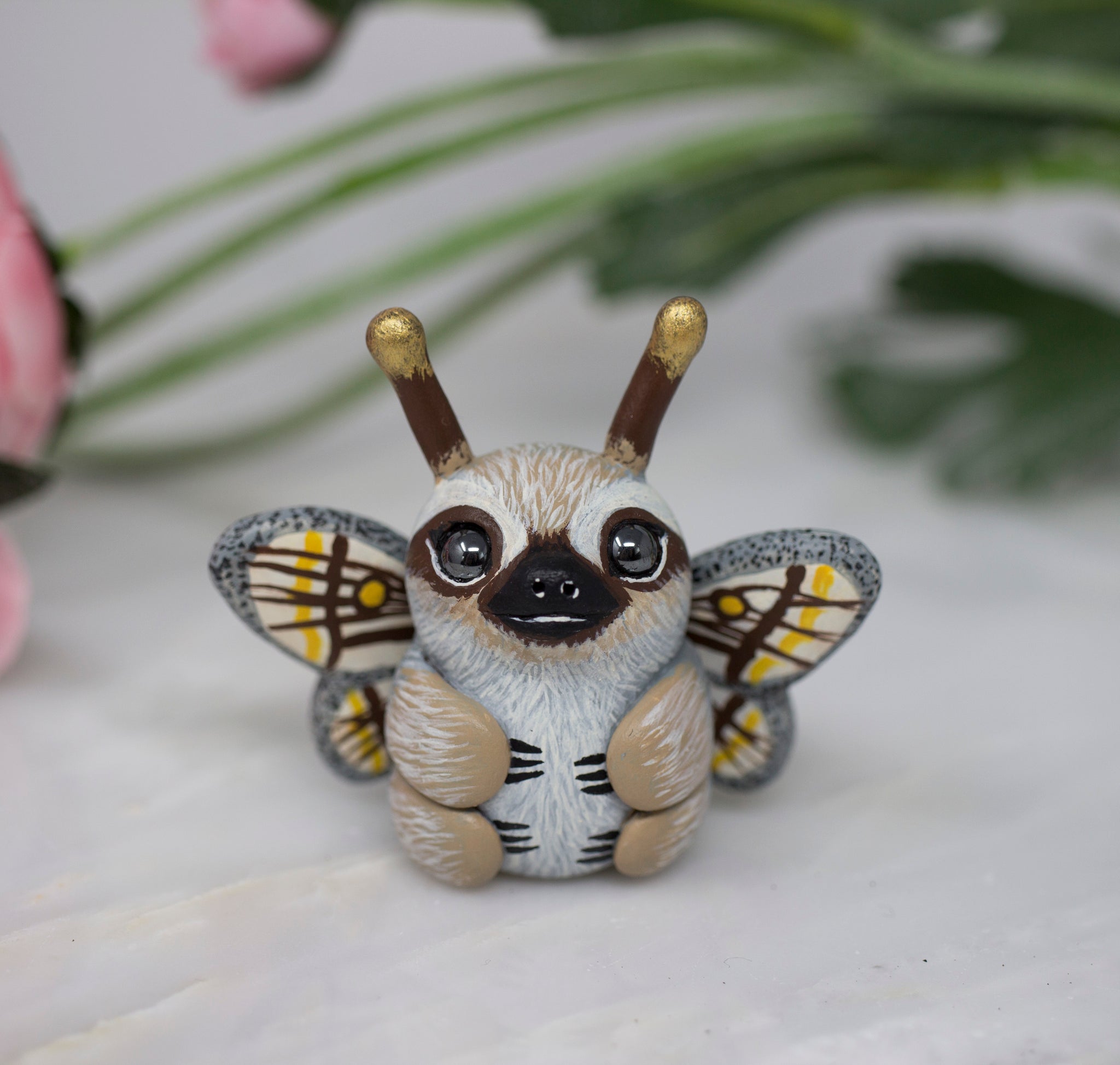Marbled Emperor Sloth Moth figurine
