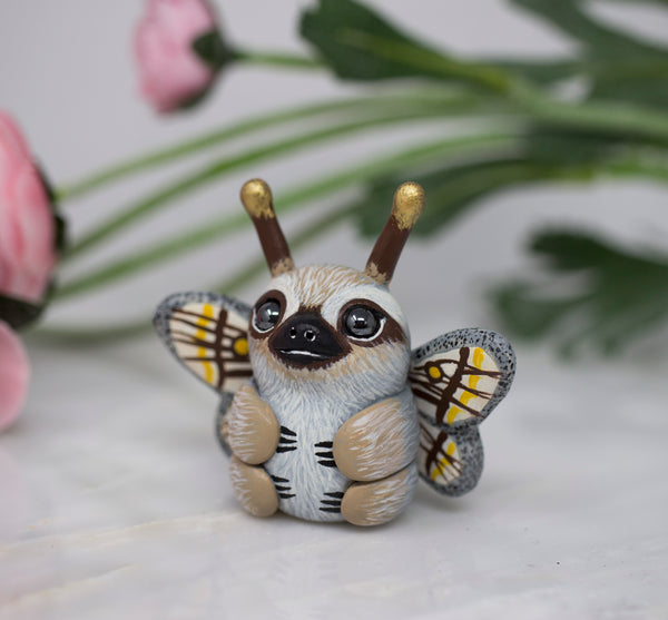 Marbled Emperor Sloth Moth figurine