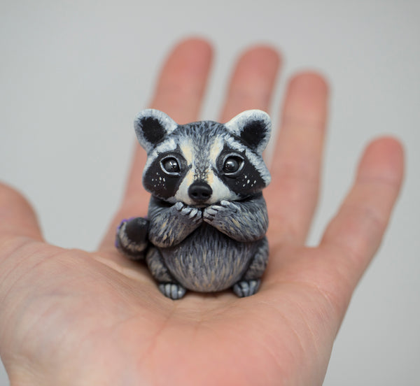 Lavender raccoon figurine