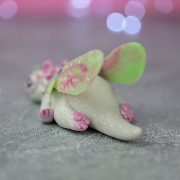 White and Pink Bored Dragon Figurine