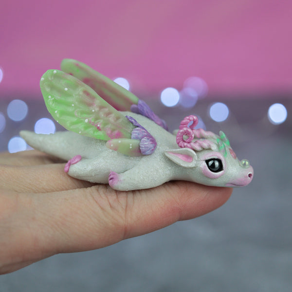 White and Pink Bored Dragon Figurine