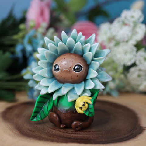 Grumpy Blue Flower Figurine