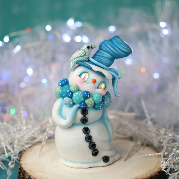 Blue Snowman Figurine