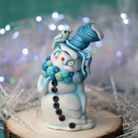 Blue Snowman Figurine