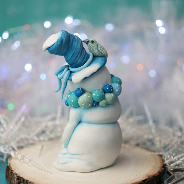 Blue Snowman Figurine