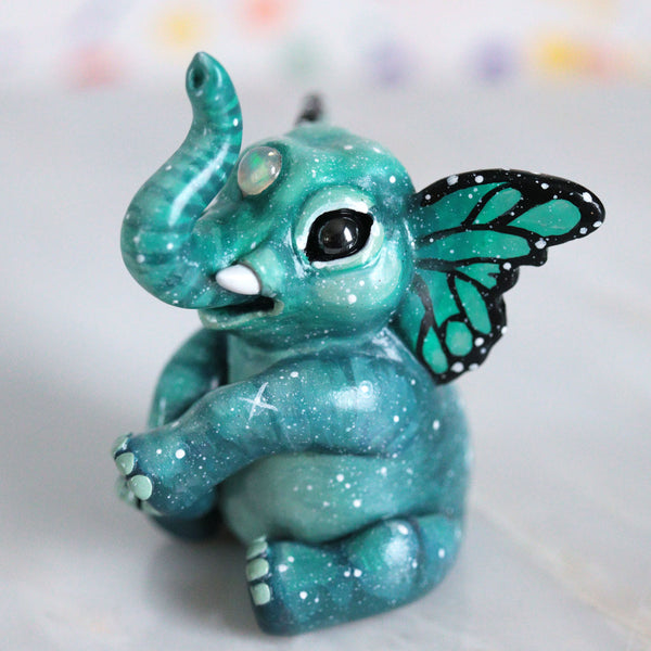 Teal Butterfant Figurine