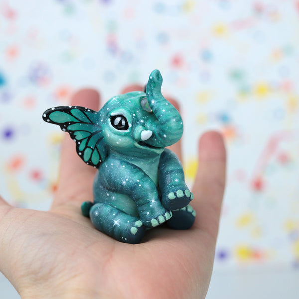 Teal Butterfant Figurine