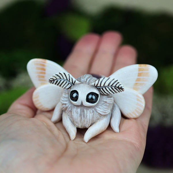 White Moth Figurine