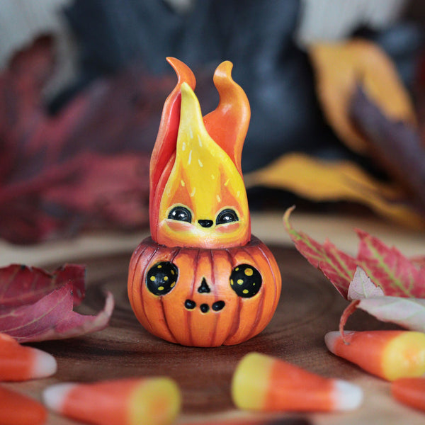 Flaming Pumpkin Happy Figurine