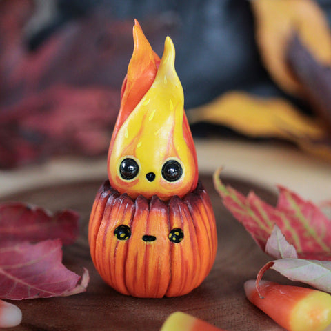 Flaming Pumpkin Spooked Figurine