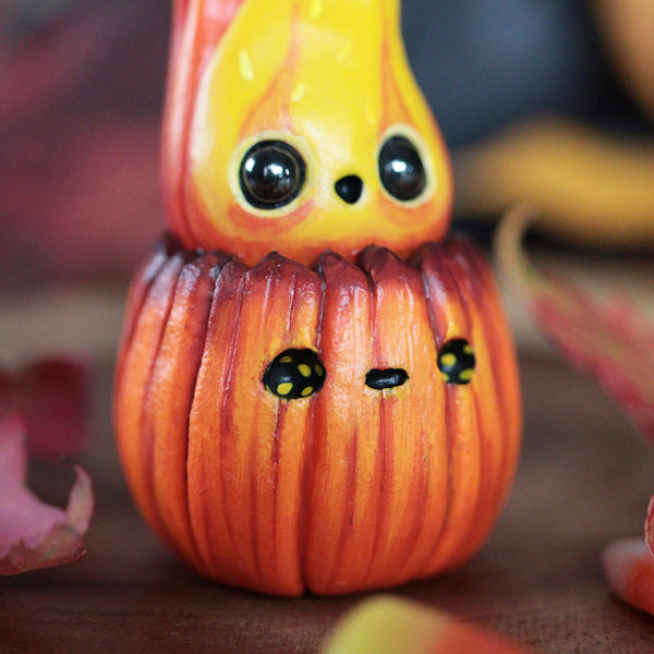 Flaming Pumpkin Spooked Figurine